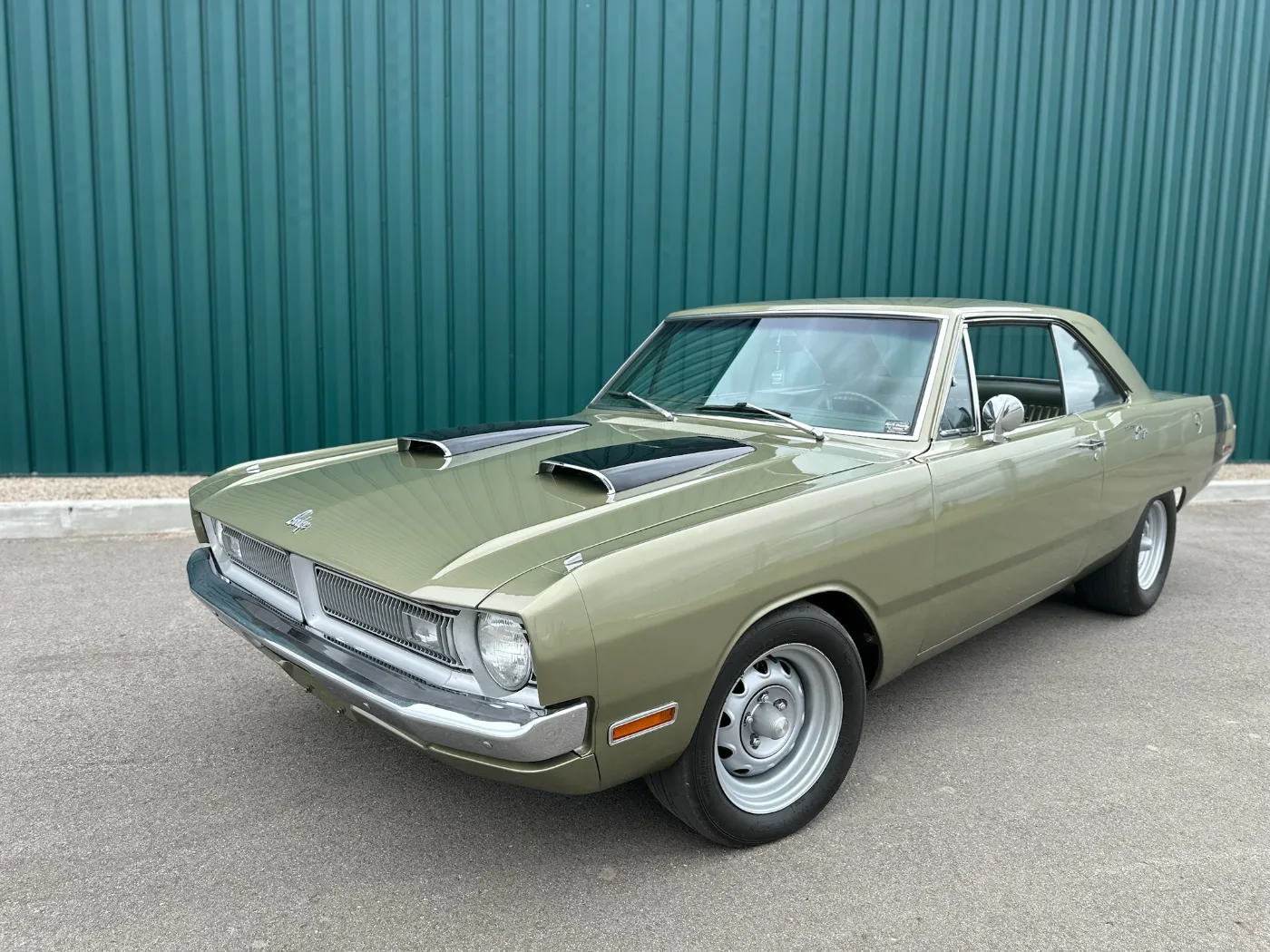 Green Dodge Dart with hood scoops built by North Country Customs